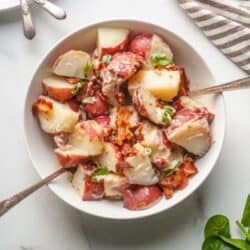 A white bowl filled with Whole30 Potato Salad.