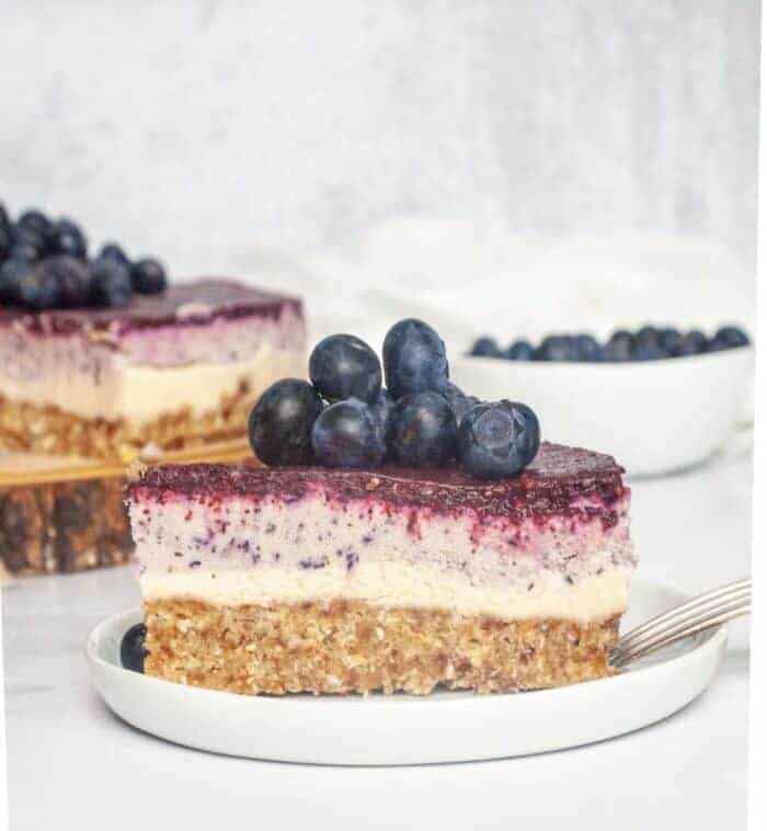 Vegan Blueberry Cheesecake on a white plate.