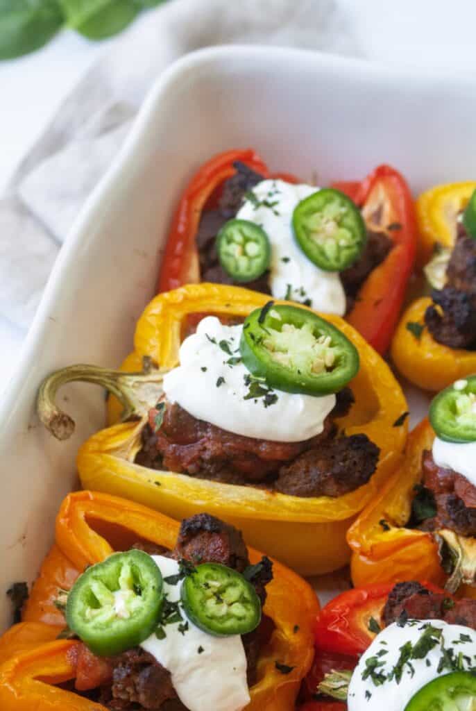 Whole30 stuffed peppers with jalapeños and sour cream