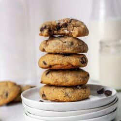 A stack of the best Paleo chocolate chip cookies on a white plate.