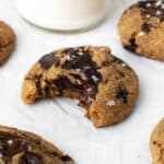 Paleo Orange Chocolate Chip cookies on white parchment paper.