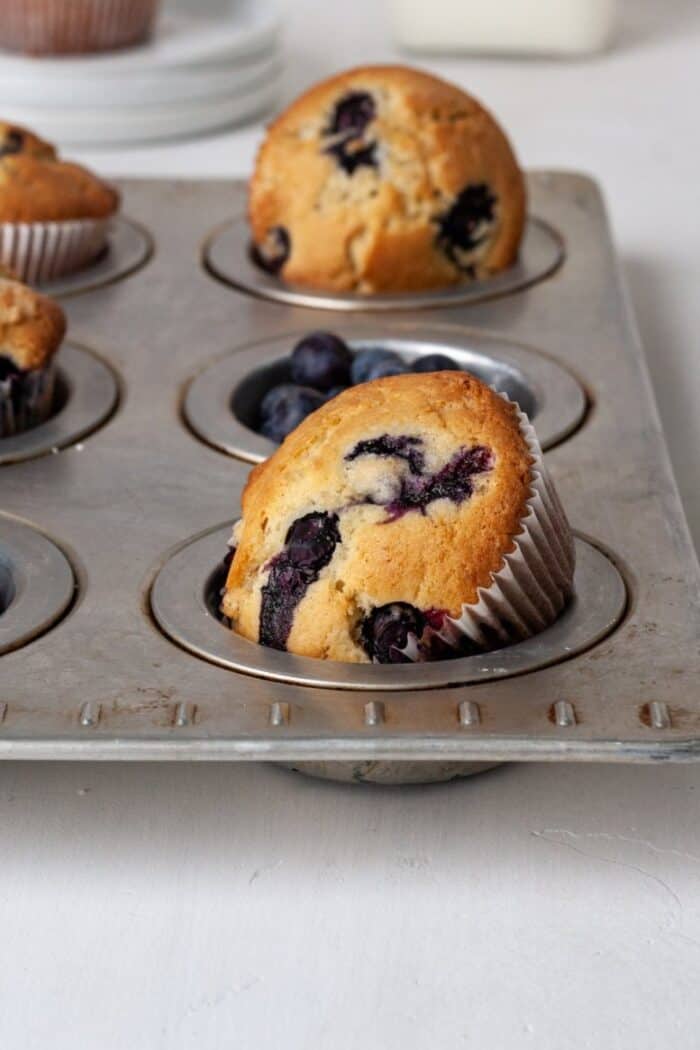 Gluten free dairy free blueberry muffins in muffin tray