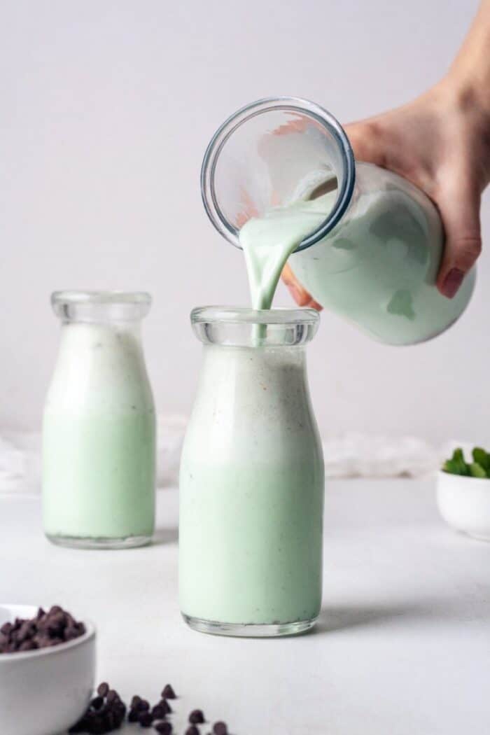 Mint chocolate smoothie in a glass jar.