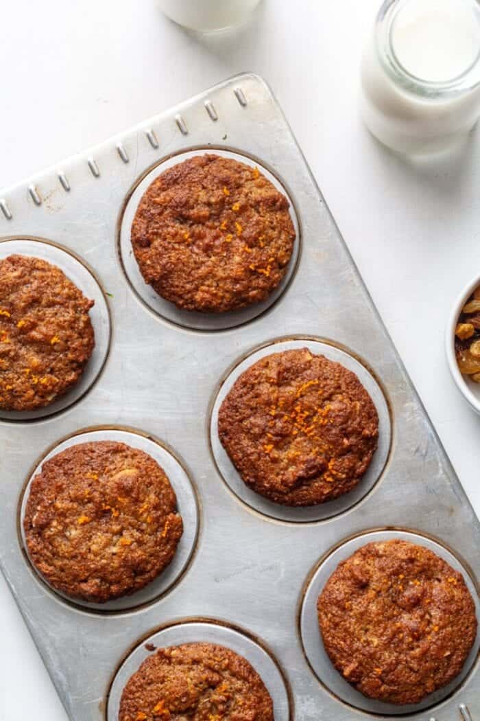 Paleo Morning Glory muffins in a silver muffin tray.