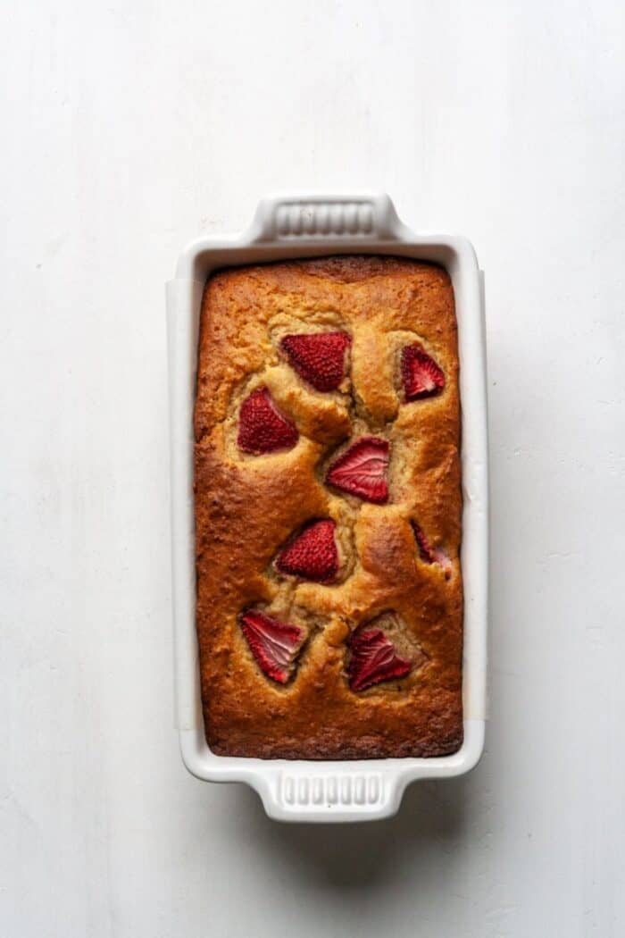 Paleo strawberry banana bread in a white loaf.