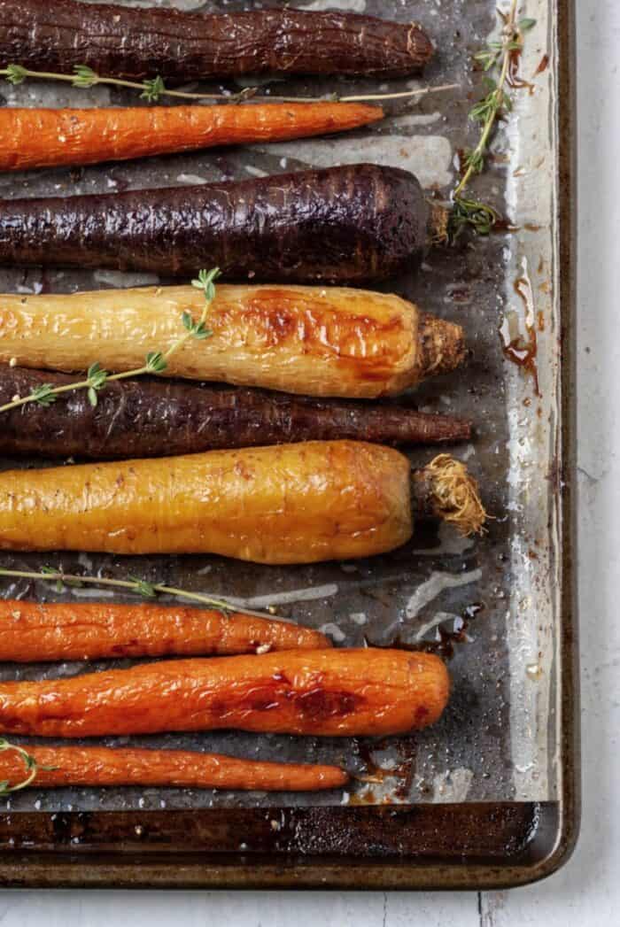 Air fryer carrots on a baking sheet.
