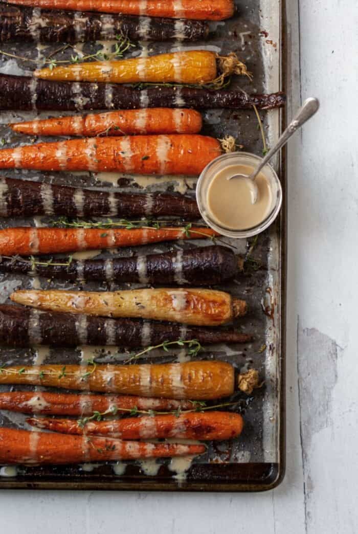 Air fried carrots on a baking sheet.