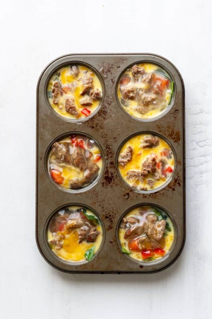 Whole30 egg muffins in a muffin tray.
