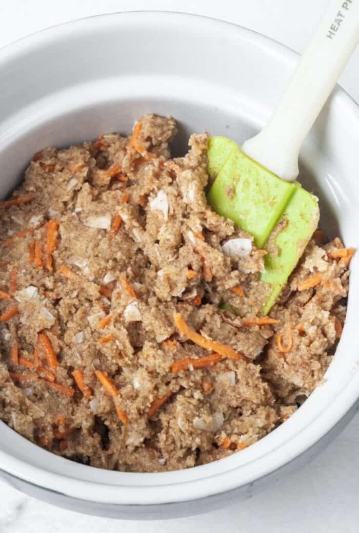 A bowl with carrot cake cookie dough.
