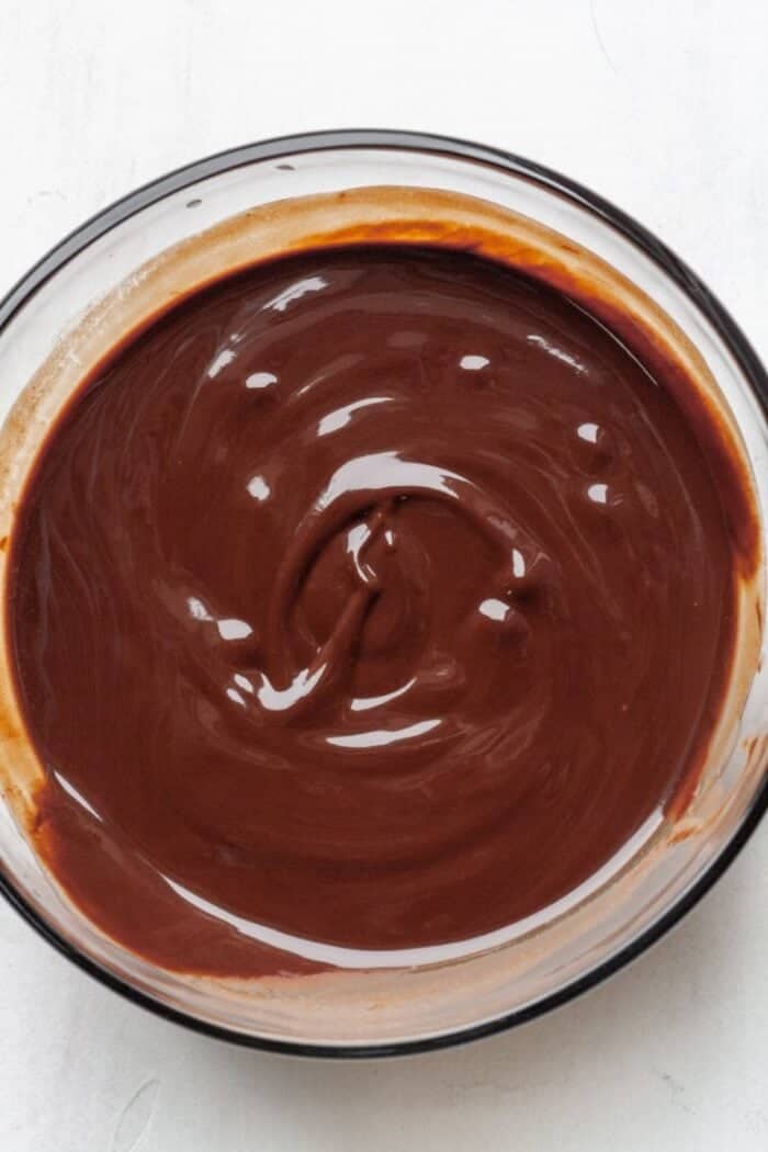 A bowl of melted dark chocolate