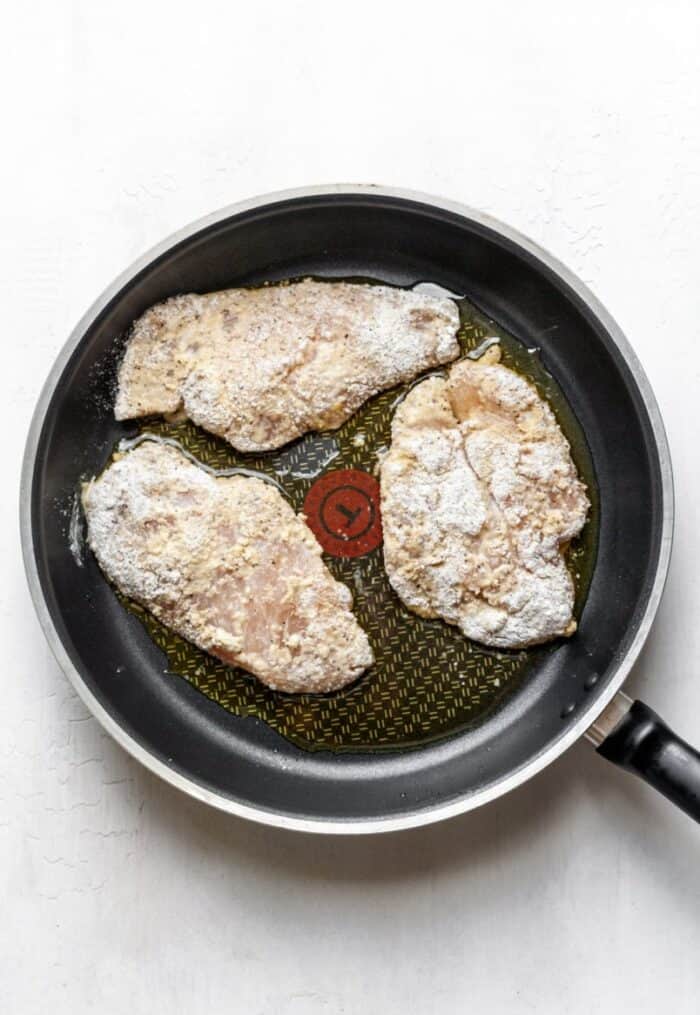 Healthy fried chicken in a skillet