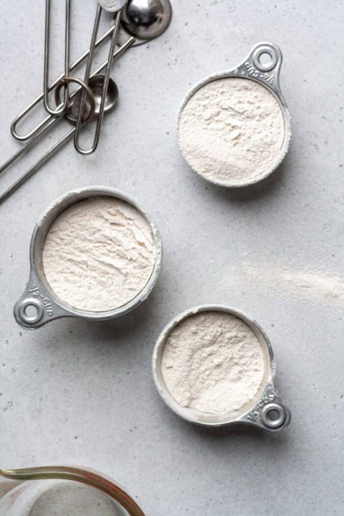 Cassava flour in measuring cups