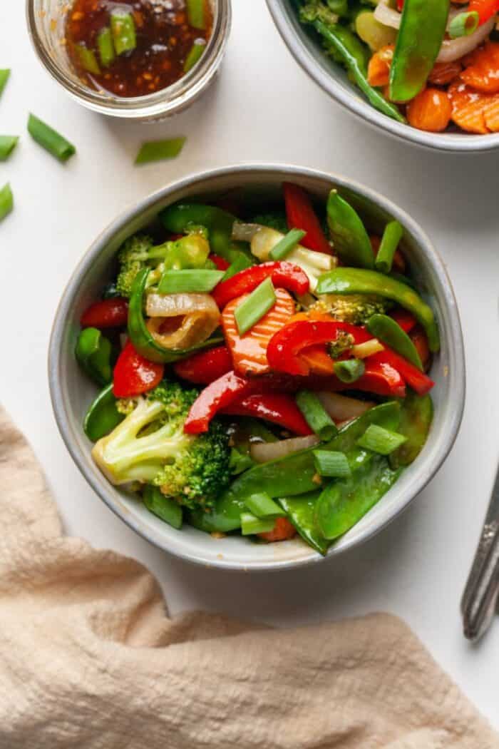 Stir fry vegetables in white bowl
