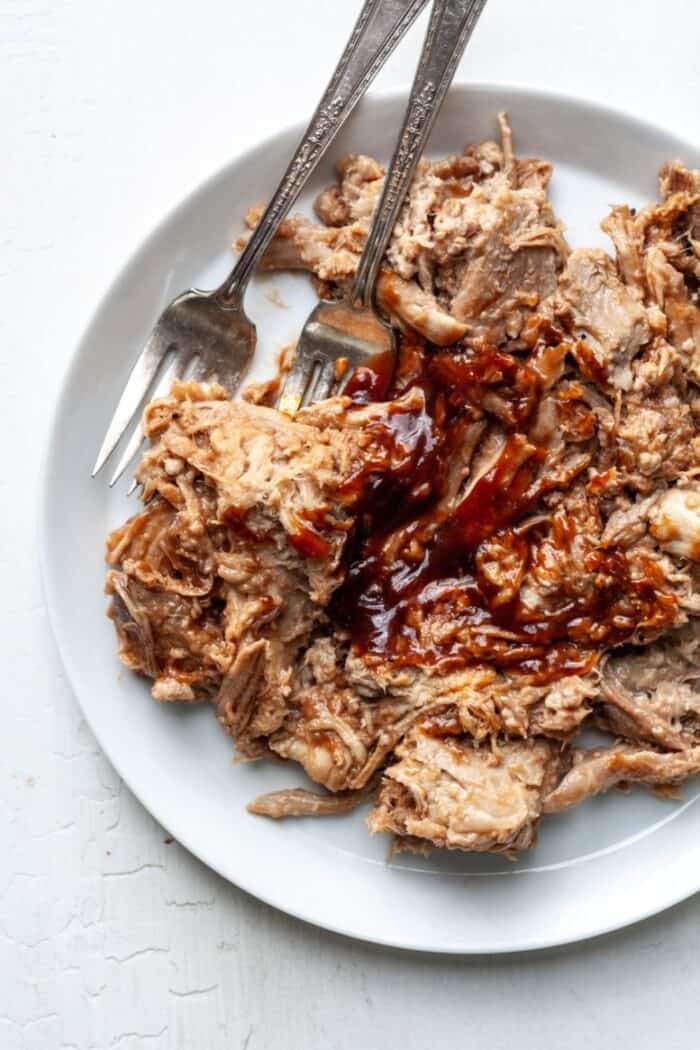 Whole30 Paleo Pulled Pork on white plate