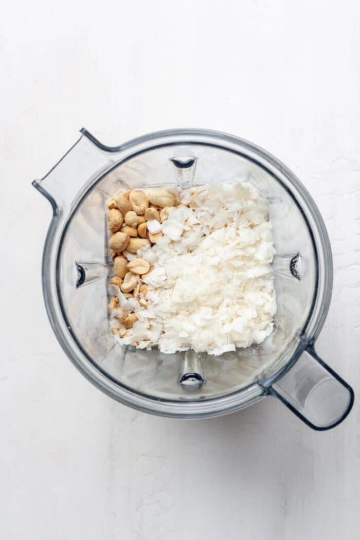 Coconut flakes and peanuts in blender