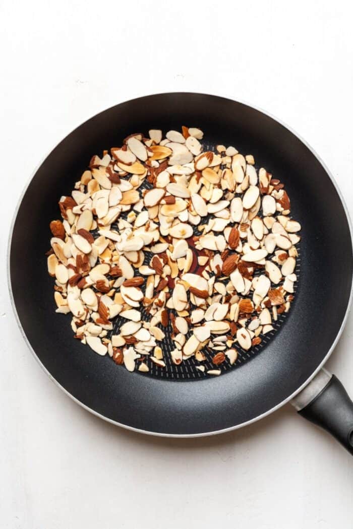 Toasted almonds in skillet
