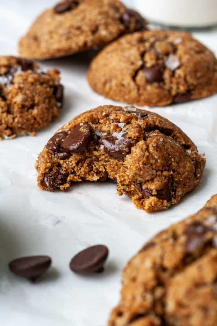 Vegan gluten free chocolate chip cookies on parchment paper
