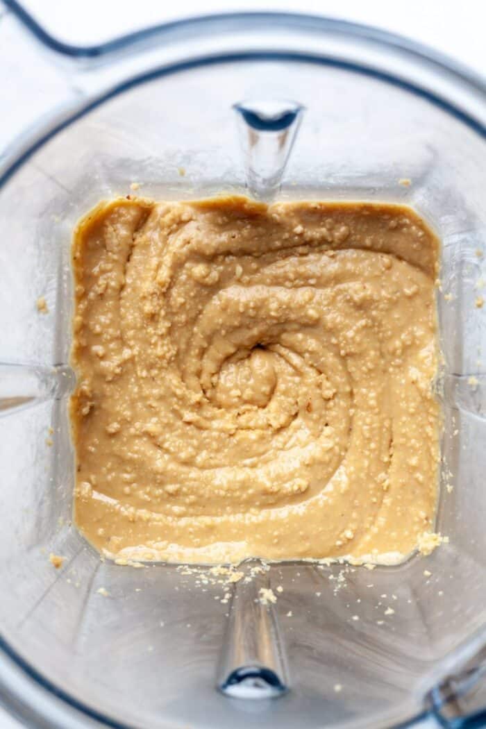Creamy homemade peanut butter in blender