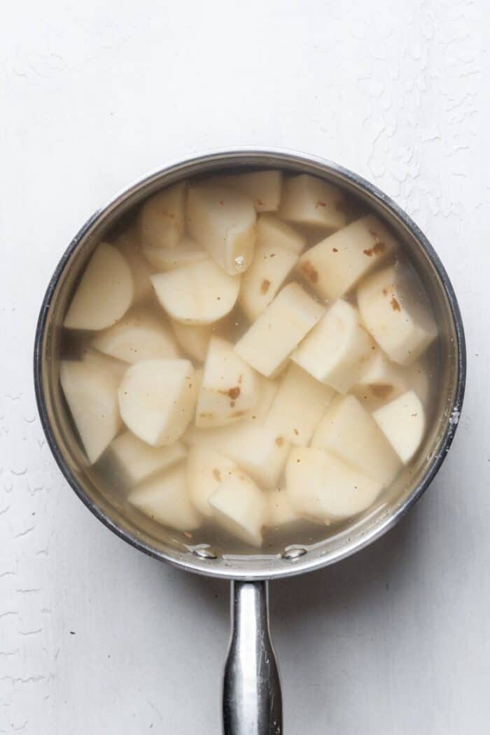 Boiled potatoes in pot