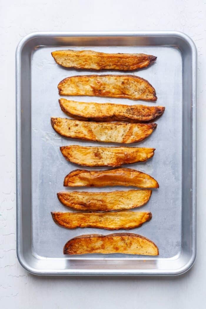 Baked fries on pan