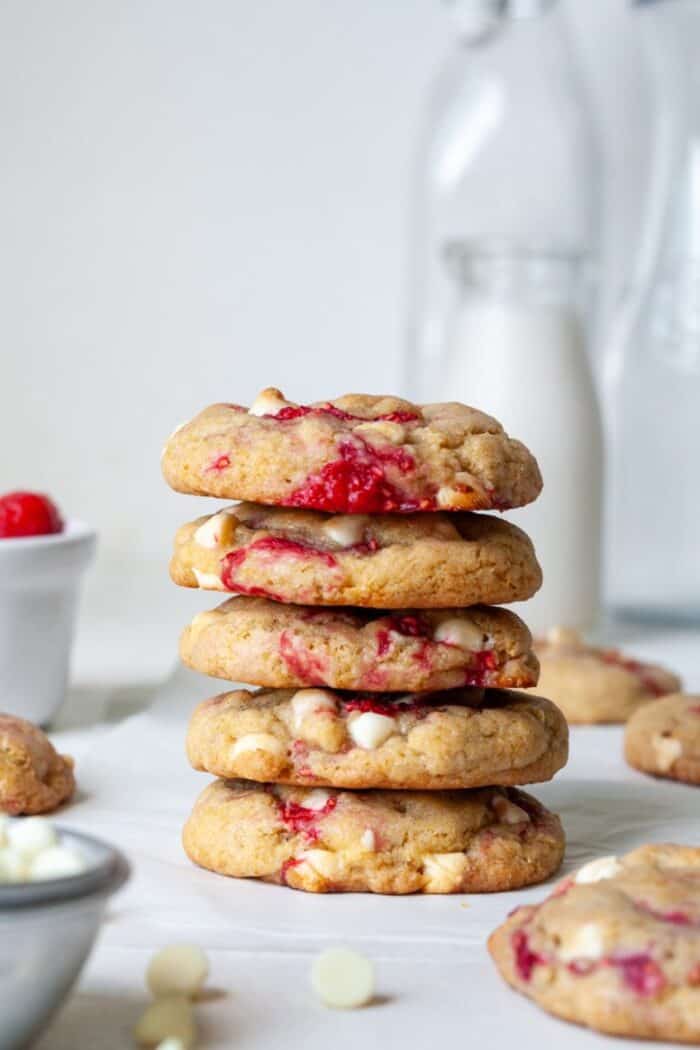 Raspberry white chocolate chip cookies with milk