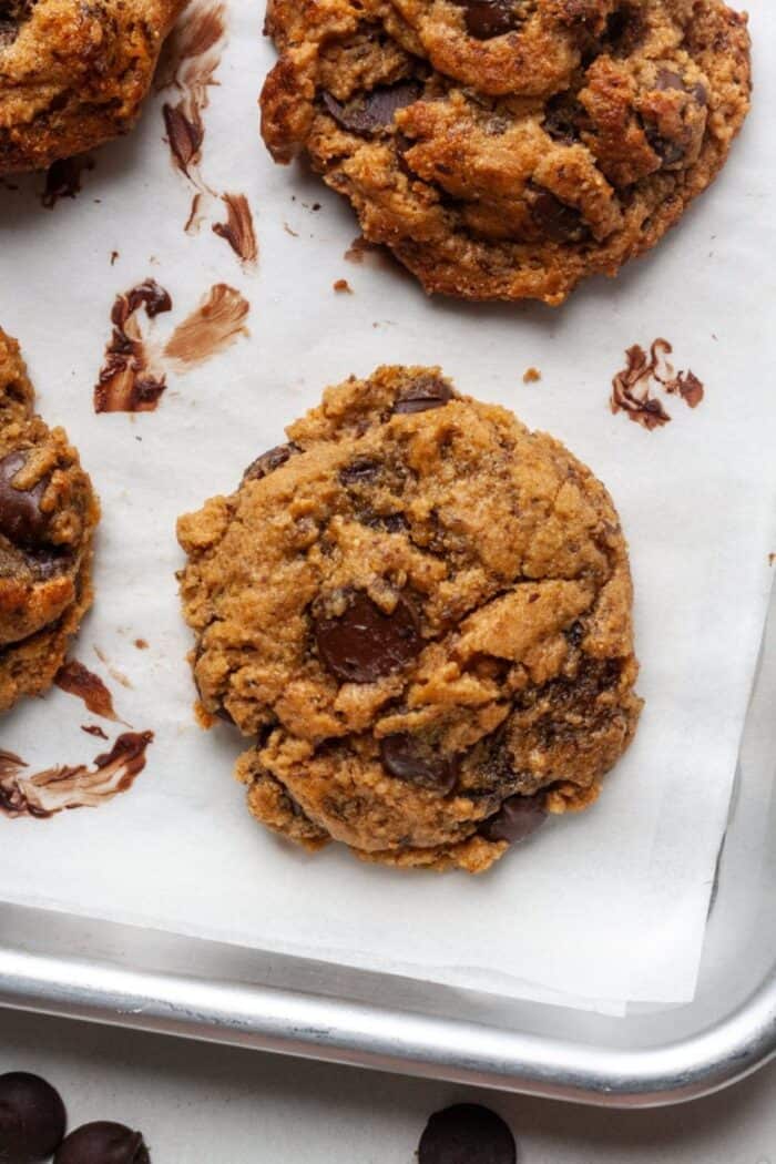 Vegan peanut butter chocolate chip cookies on pan