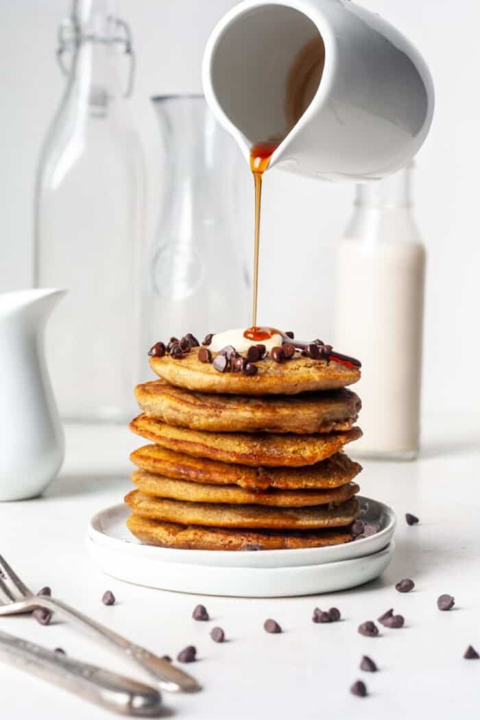 Fluffy oat flour pancakes with syrup