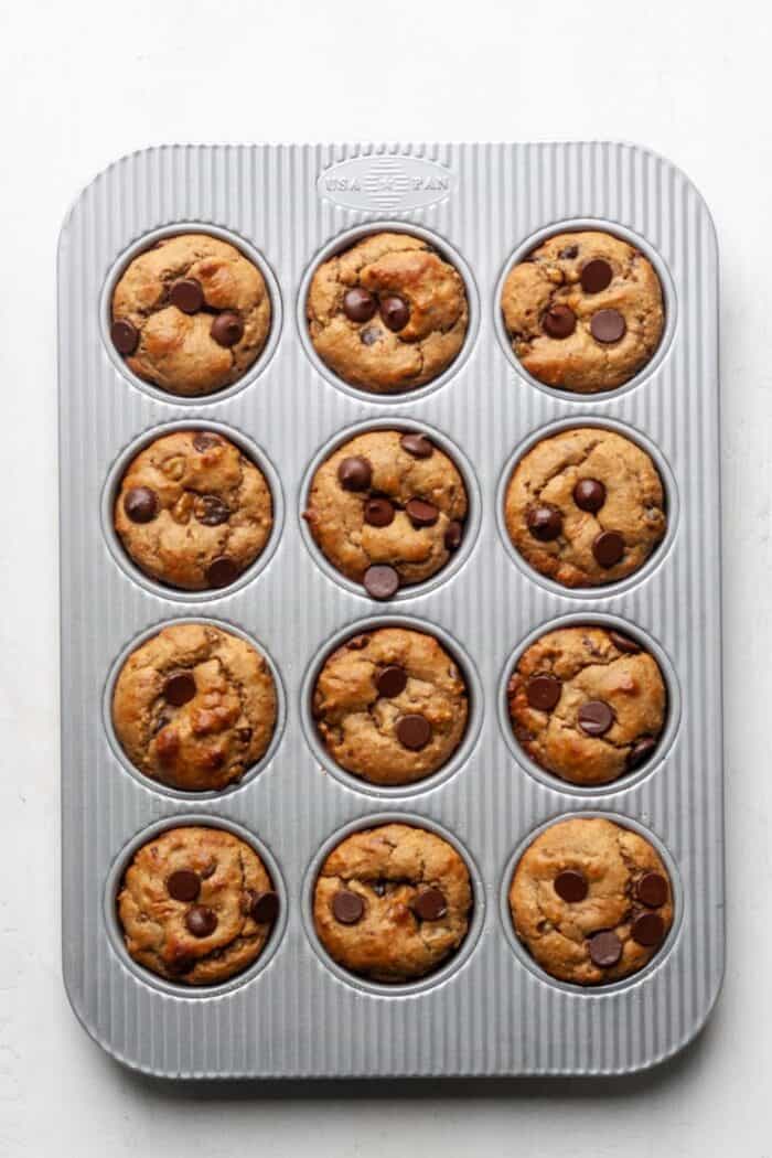 Healthy chocolate chip muffins in pan