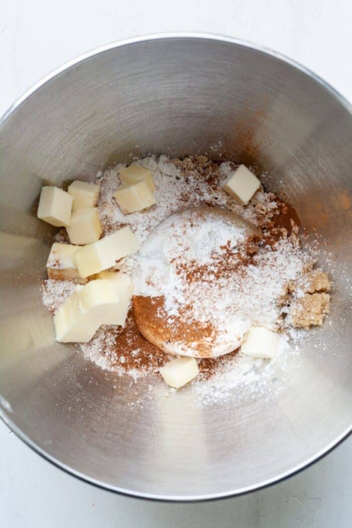 Butter, oats and sugar in bowl