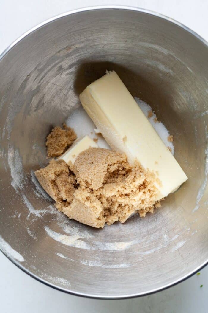 Butter and sugars in mixing bowl