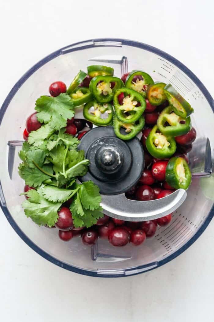 Cranberries and jalapenos in food processor