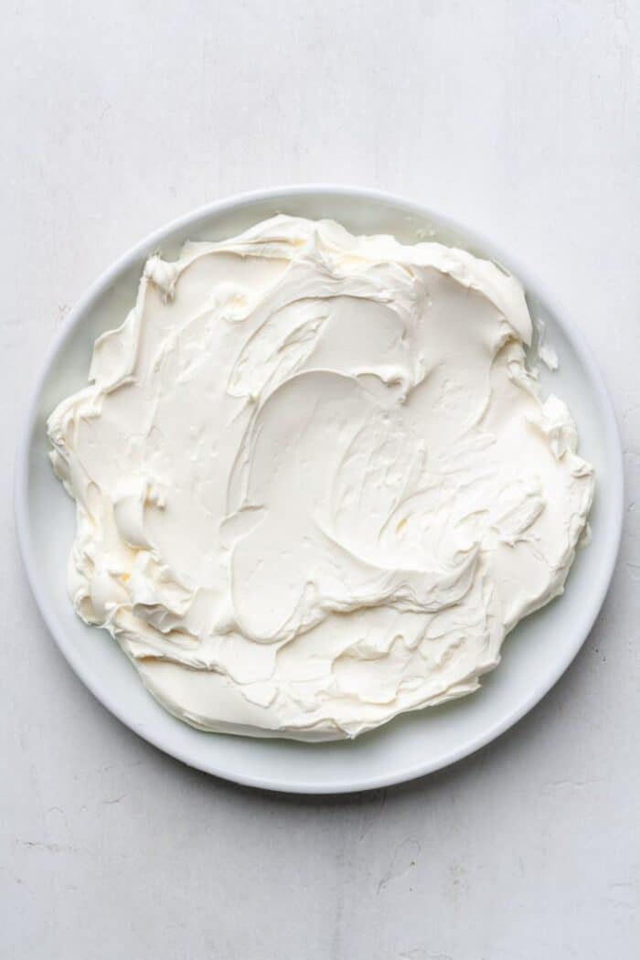 Cream cheese on white plate