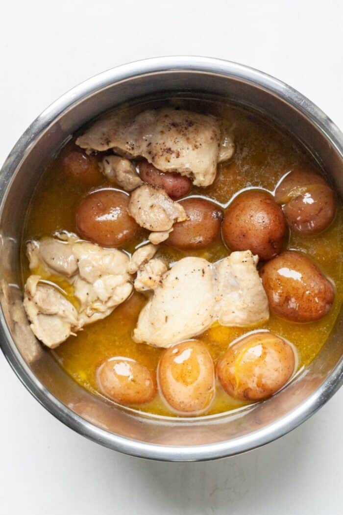 Chicken and potatoes in bowl
