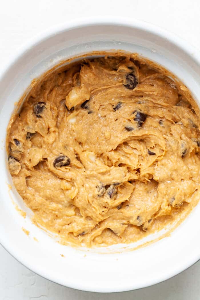 Pumpkin batter with chocolate chips in bowl