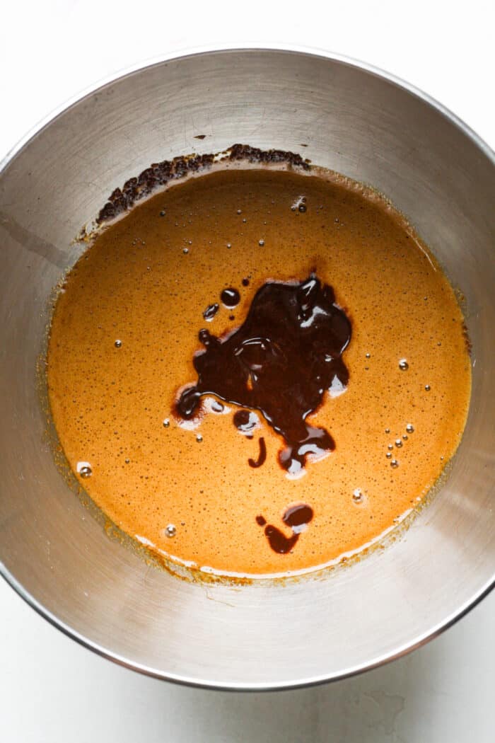 Frothy dark chocolate mixture in bowl