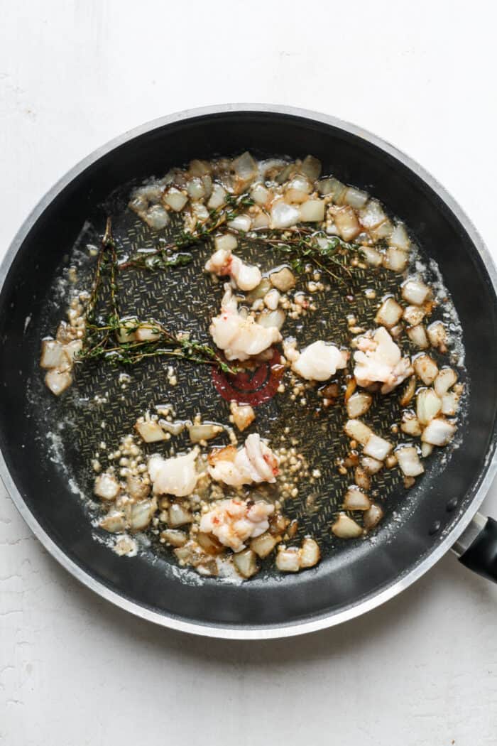 Lobster and thyme in pan
