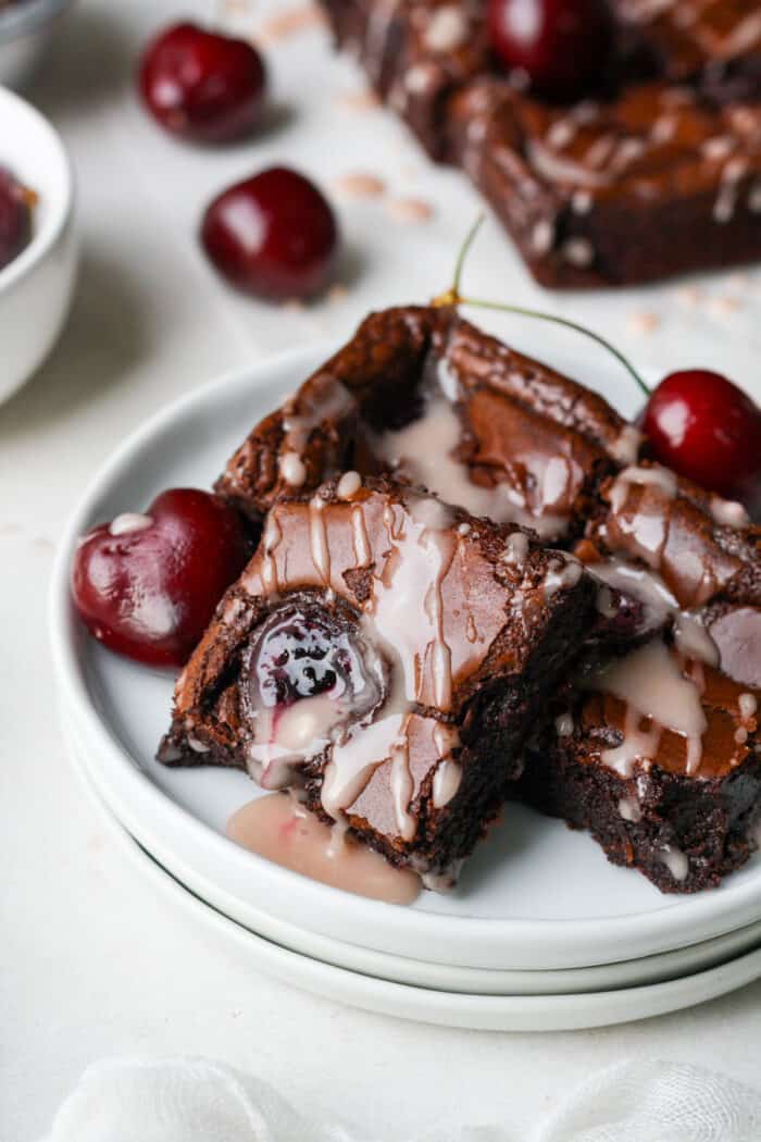 Dark chocolate cherry brownies on plate