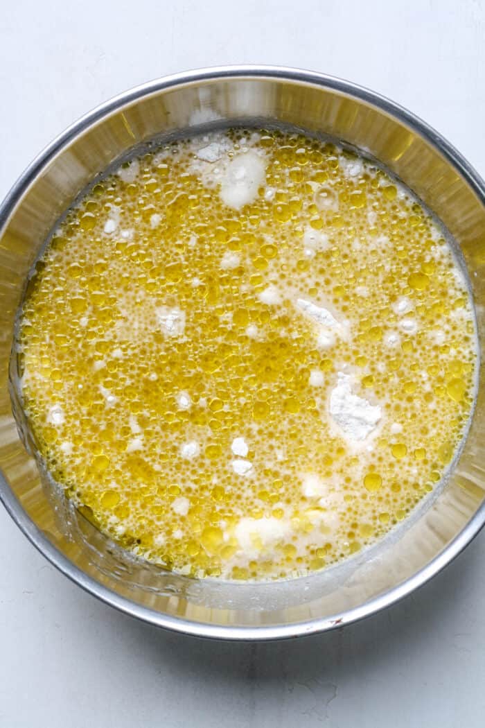 Curdled milk and oil in bowl