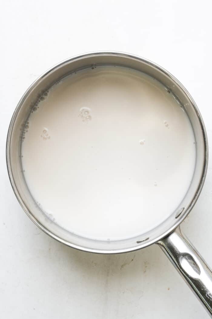Almond milk in saucepan