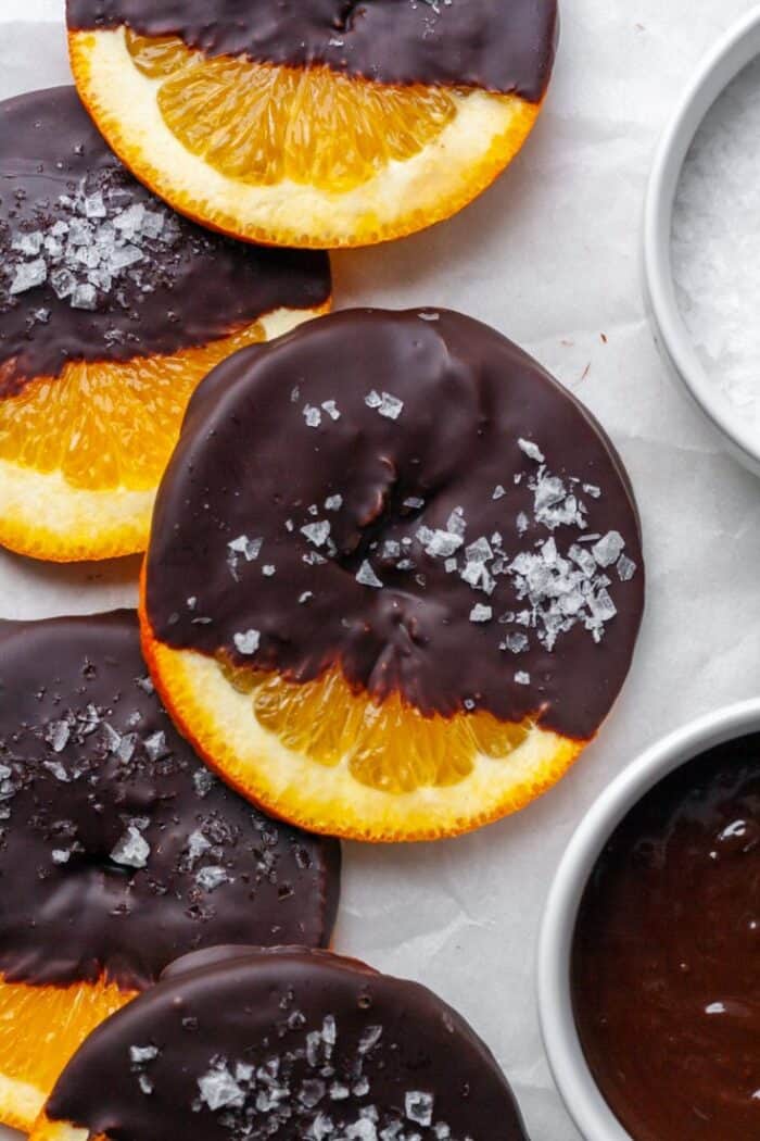 Slices of orange with dark chocolate coating