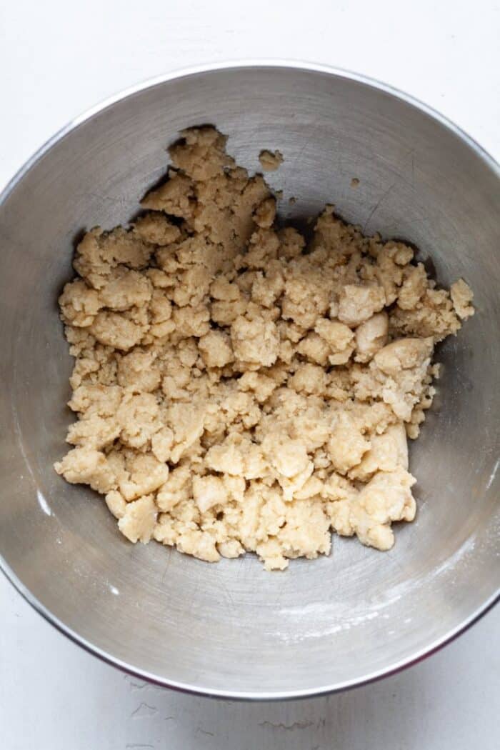 Crumbly cookie dough in bowl