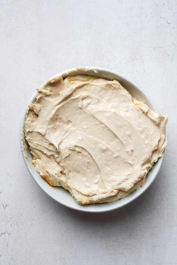 Sweet cream cheese in white bowl