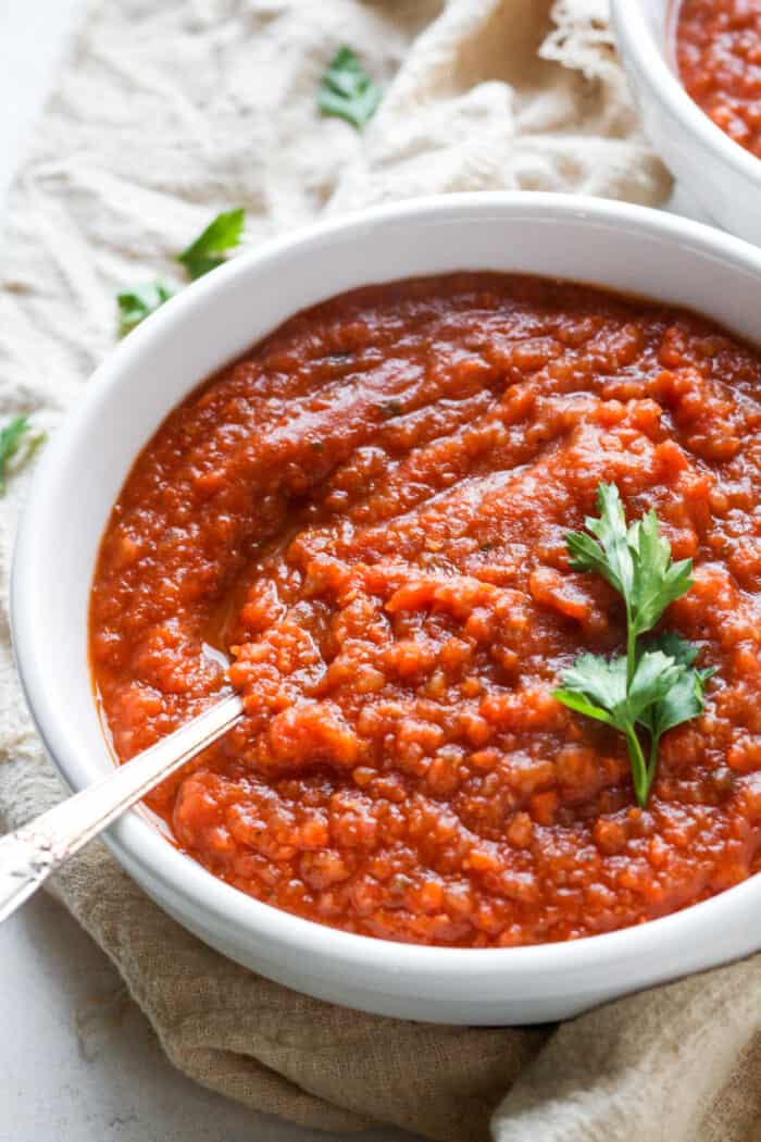 Gluten free tomato soup in white bowl