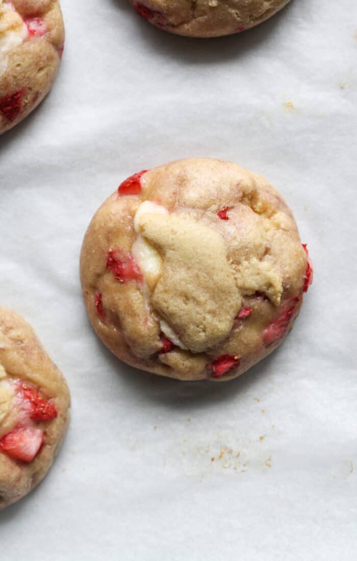 Strawberry cheesecake cookies on pan