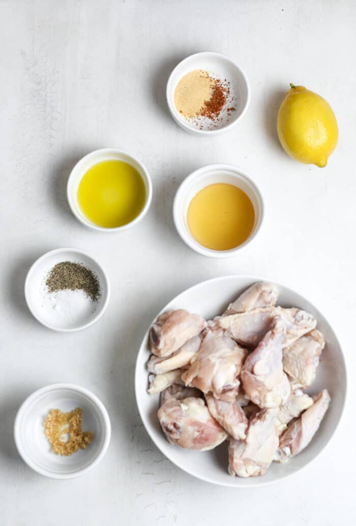 Chicken wings ingredients in small bowls