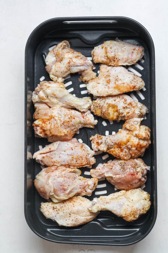 Chicken wings in air fryer basket