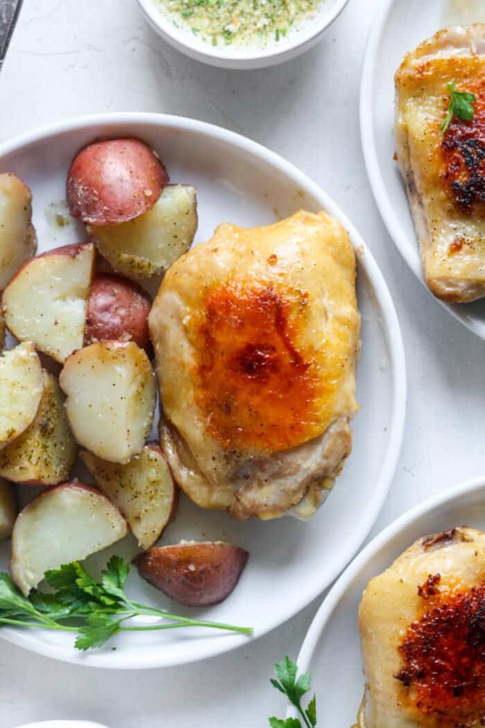 Chicken with potatoes on plate