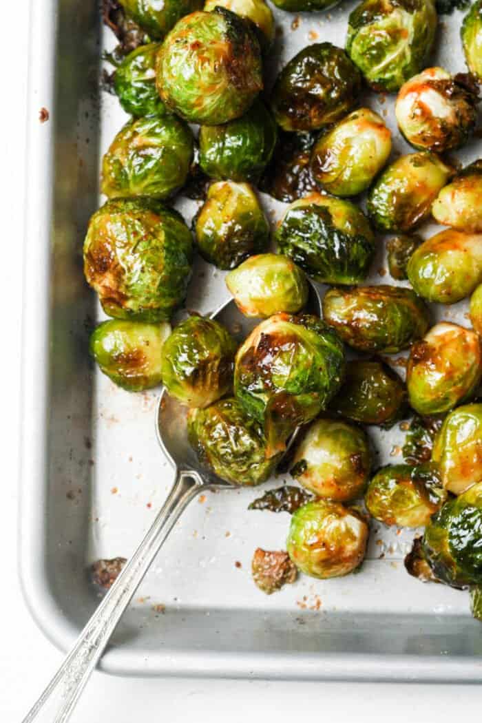 Pan of honey sriracha Brussels sprouts on pan