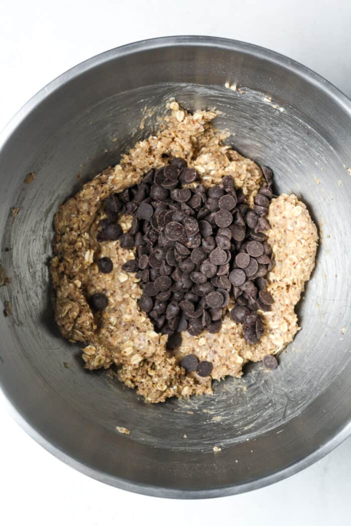 Dark chocolate chips in oatmeal cookie dough
