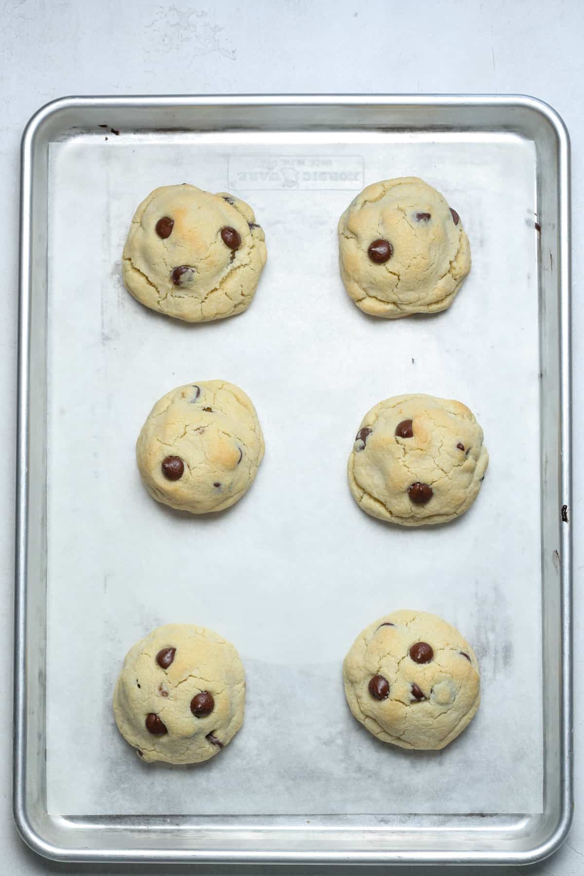 Baked stuffed cookies on pan